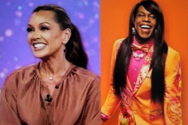 Two women smiling and talking on a brightly colored television set.